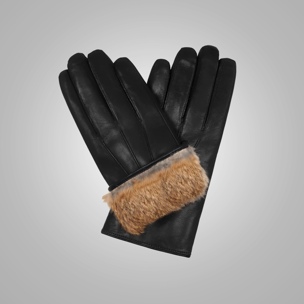 Black leather gloves with brown fur cuff on a gray background