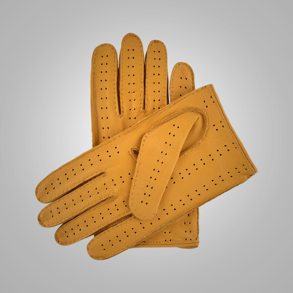 Pair of mustard yellow leather gloves on a gray background