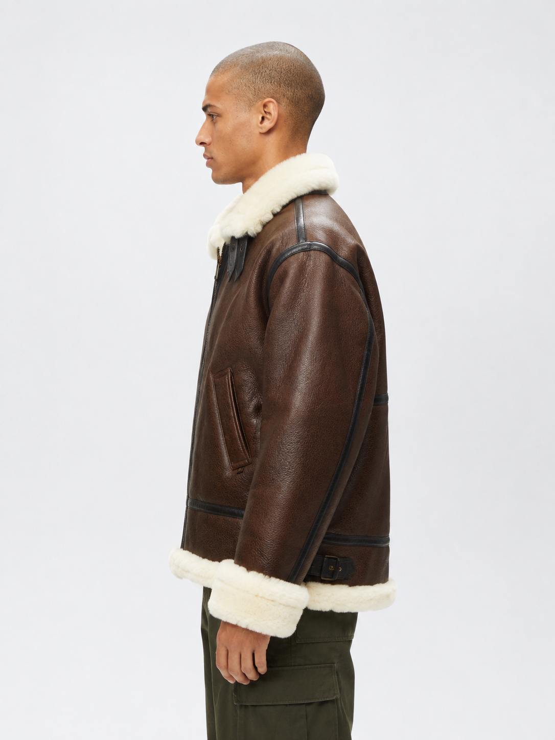 men side view wearing brown shearling leather jacket