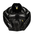 A black puffer jacket with a glossy, patent-like finish, featuring a black fur collar, a front zipper closure, and small yellow accent tabs on the chest.