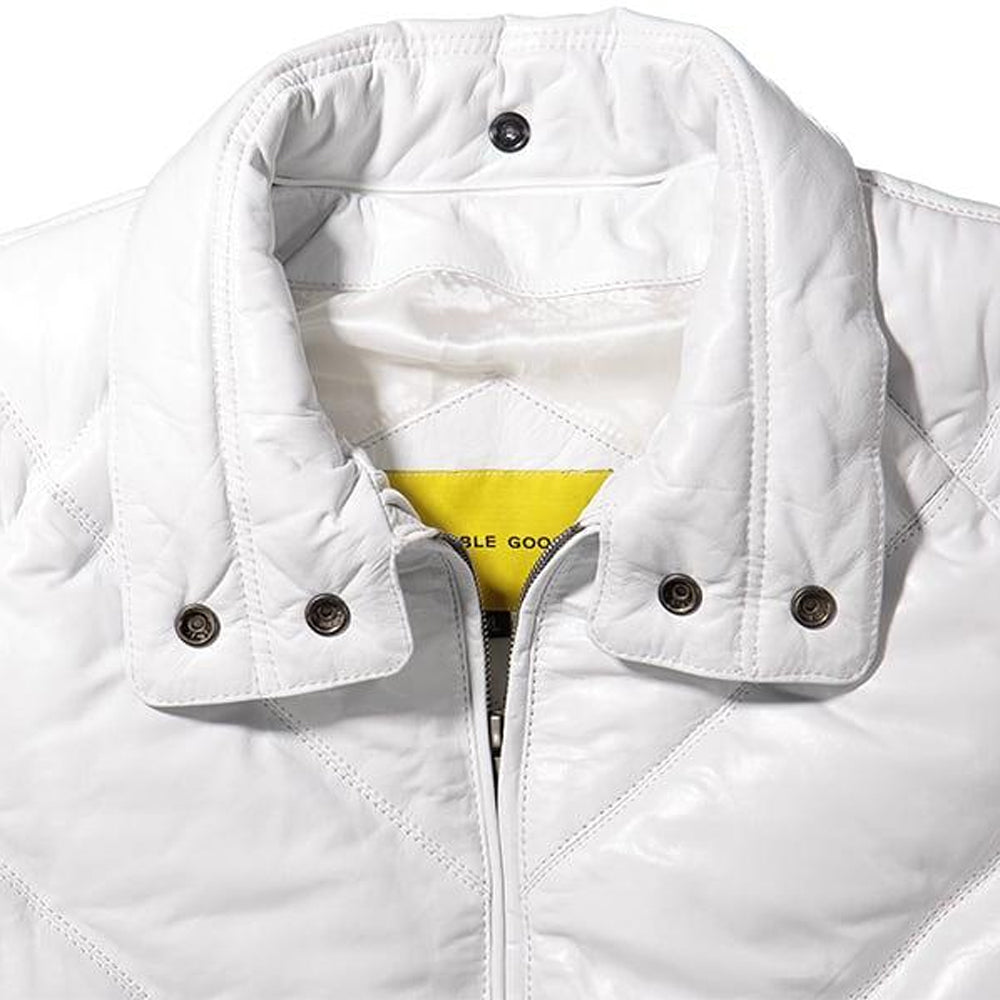 Close-up of a white quilted jacket with a high collar, snap-button flap, and a bright yellow inner neck label reading double goose