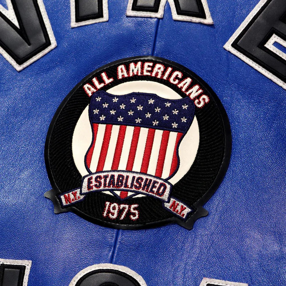 Patch on a blue background with 'All Americans' and 'Established 1975' text