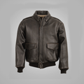 A brown leather men's flying jacket with a mandarin collar, zipper front, and flap-covered pockets.