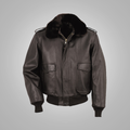 Men's brown cowhide leather flight jacket with a fur collar, snap button closures, and a zippered front.