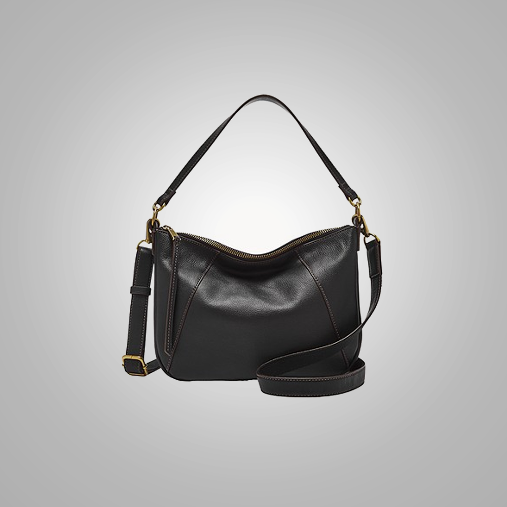 A black sheepskin leather backpack with a shoulder strap and gold-tone hardware.