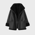 Black sheepskin shearling leather jacket with a high-standing collar, wide lapels, and zip fastening. The jacket is displayed open, showing the interior lining.