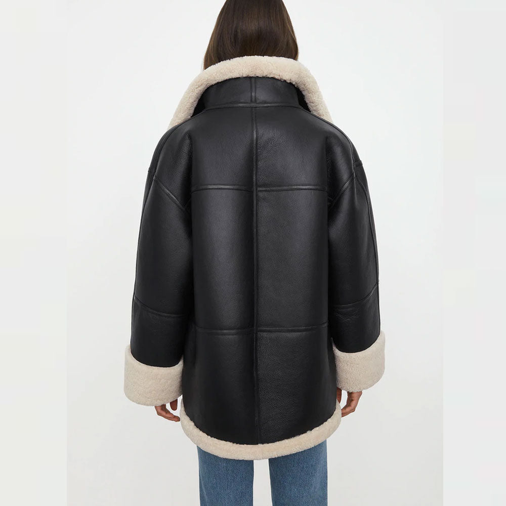 back side of women black shearling jacket